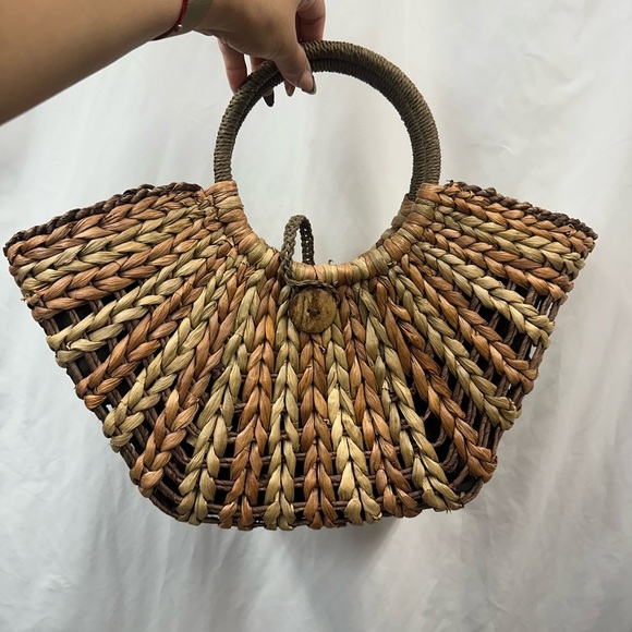 Handbags - Woven Rattan purse with a button closure and wrapped handles